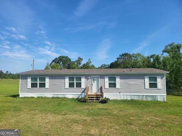 231 Canady Bridge Rd, Twin City, GA 30471 - manufactured / mobile home with a front lawn