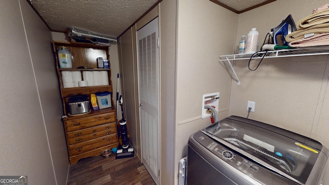 231 Canady Bridge Rd, Twin City, GA 30471 - washroom featuring washer / dryer, wood finished floors, and a textured ceiling