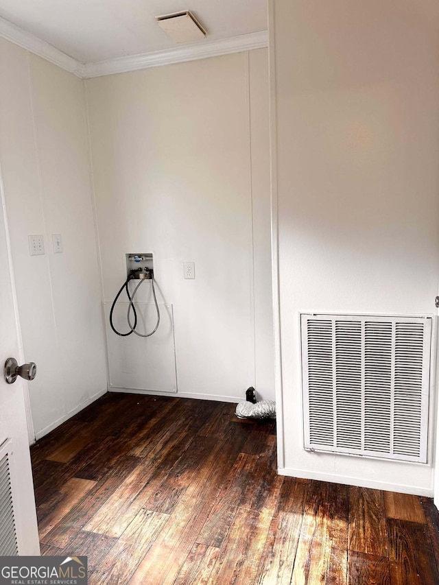 laundry room with hookup for a washing machine, ornamental molding, and dark wood-type flooring