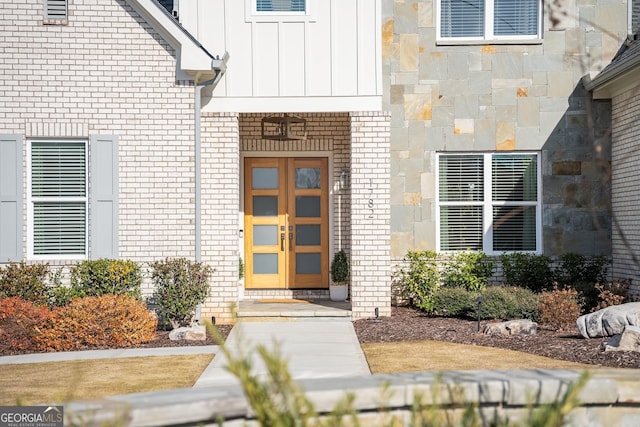 entrance to property featuring french doors