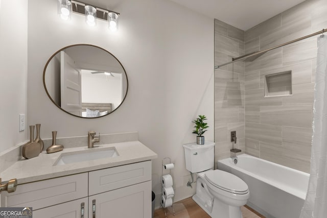 full bathroom with vanity, toilet, and shower / tub combo