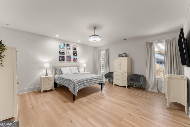 bedroom featuring light hardwood / wood-style floors