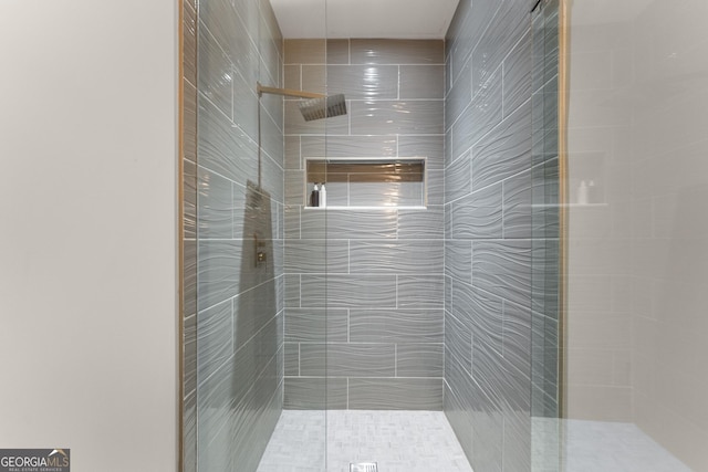 bathroom featuring an enclosed shower