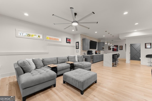 living room with light hardwood / wood-style flooring