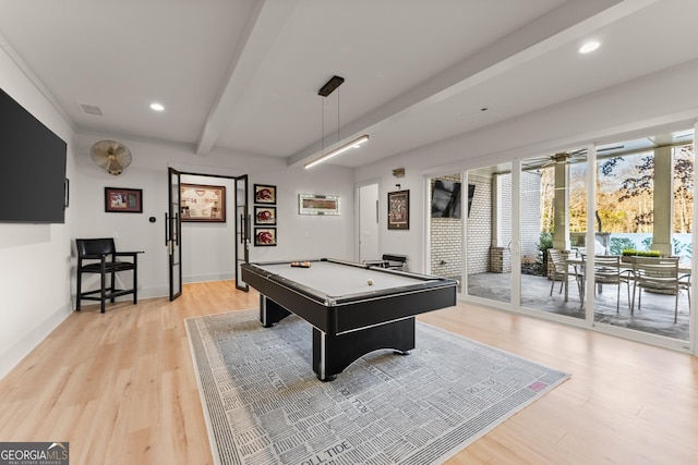 game room with ceiling fan, pool table, light hardwood / wood-style flooring, and beamed ceiling