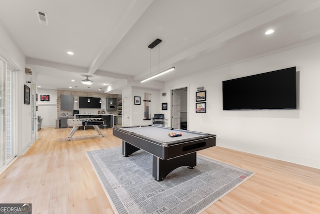 playroom with beam ceiling, light hardwood / wood-style flooring, and pool table