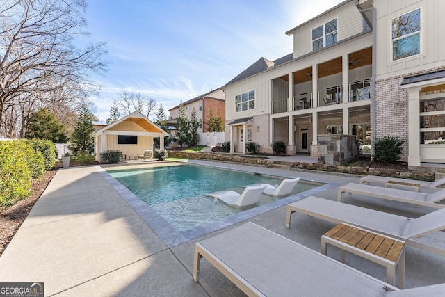 view of pool featuring a patio