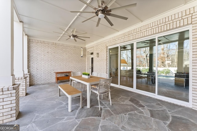 view of patio / terrace featuring ceiling fan