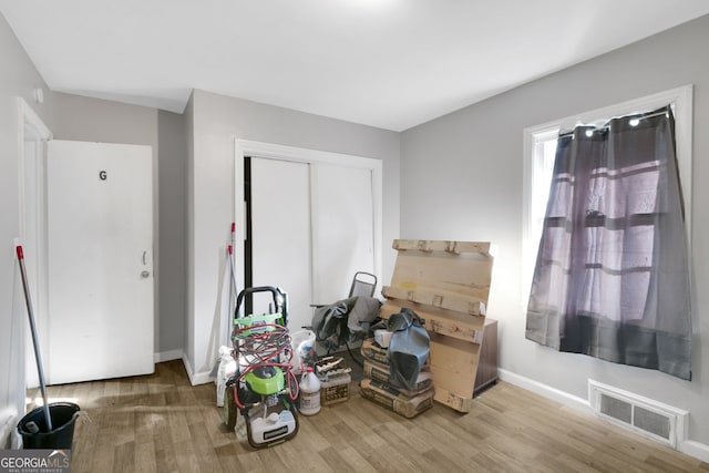 interior space with hardwood / wood-style floors