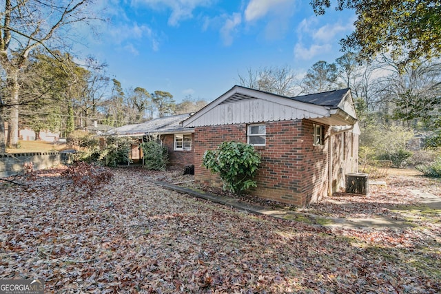 view of side of property with cooling unit