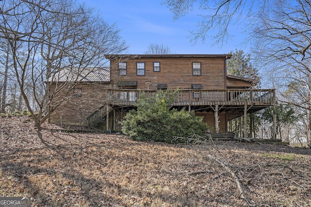 back of property with a deck