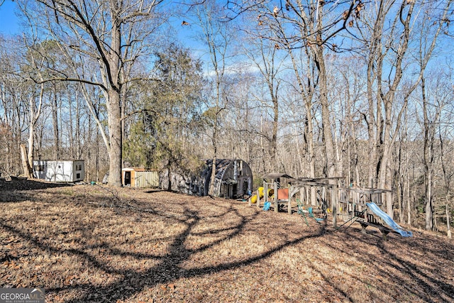 view of yard featuring a playground