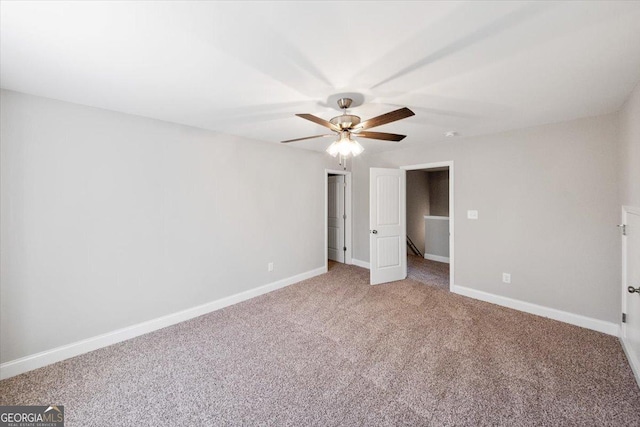 unfurnished bedroom featuring carpet floors and ceiling fan