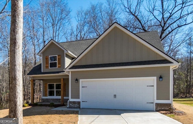 view of front facade featuring a garage and covered porch