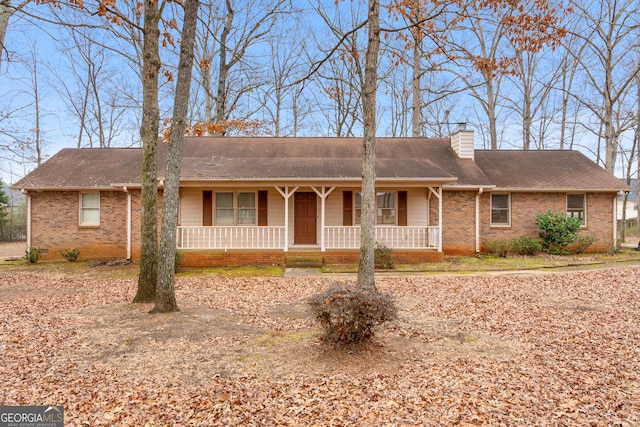 ranch-style home with a porch