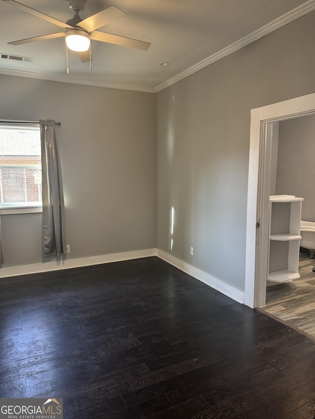 unfurnished room featuring ornamental molding, dark wood-type flooring, and ceiling fan