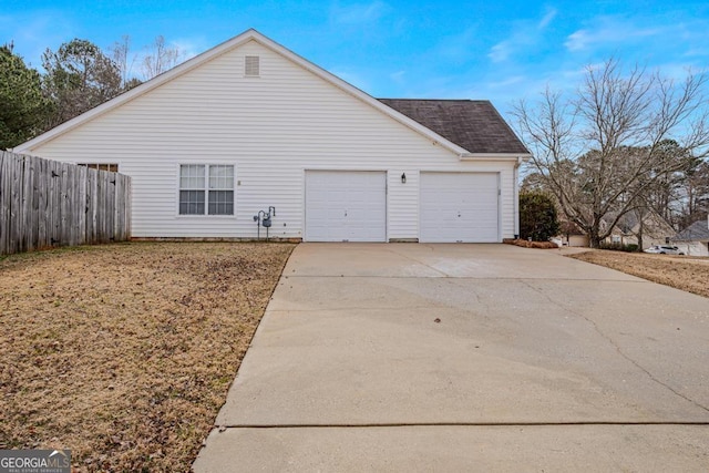 view of property exterior featuring a garage