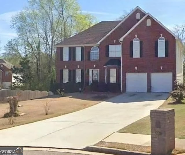 view of front of house with a garage