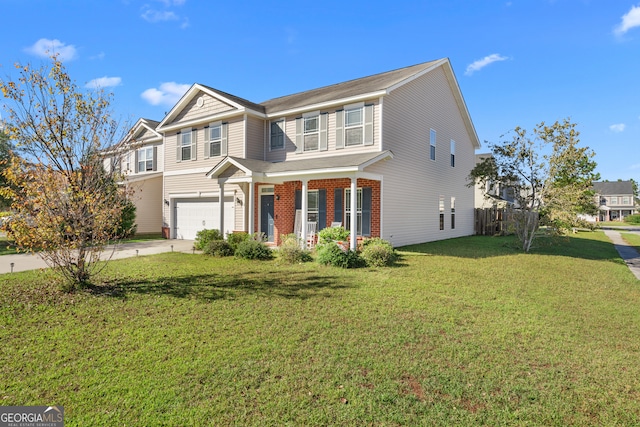 view of front of property featuring a garage and a front lawn