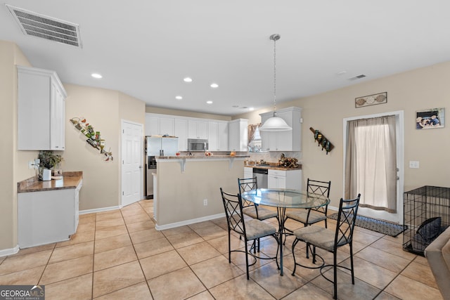 view of tiled dining area