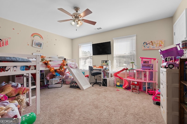 carpeted bedroom featuring ceiling fan