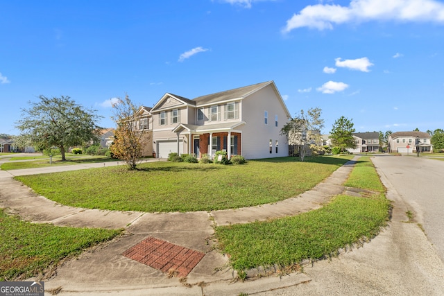 front of property featuring a garage and a front lawn