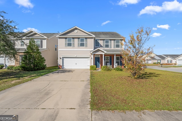 view of front of property featuring a garage and a front yard