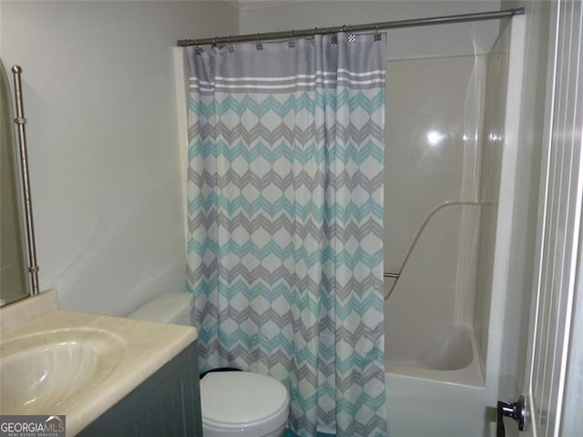 full bathroom with vanity, toilet, and shower / bath combo with shower curtain