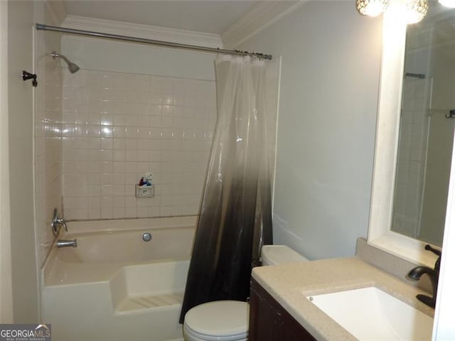 full bathroom featuring crown molding, shower / tub combo with curtain, vanity, and toilet