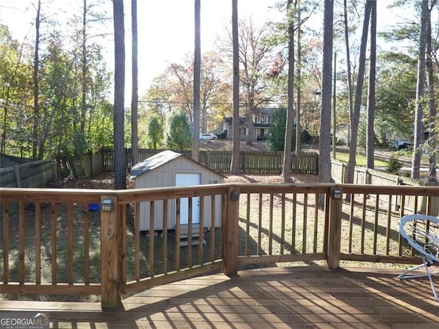 wooden deck featuring a storage shed