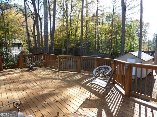 deck with a storage shed