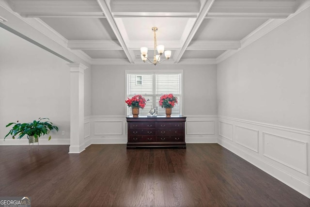 dining area with dark hardwood / wood-style floors, decorative columns, coffered ceiling, a notable chandelier, and beam ceiling