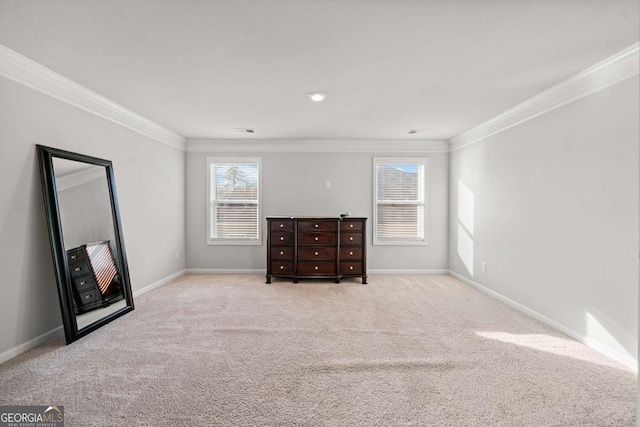 unfurnished bedroom featuring light colored carpet and ornamental molding