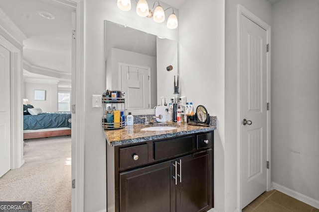 bathroom with vanity and tile patterned flooring