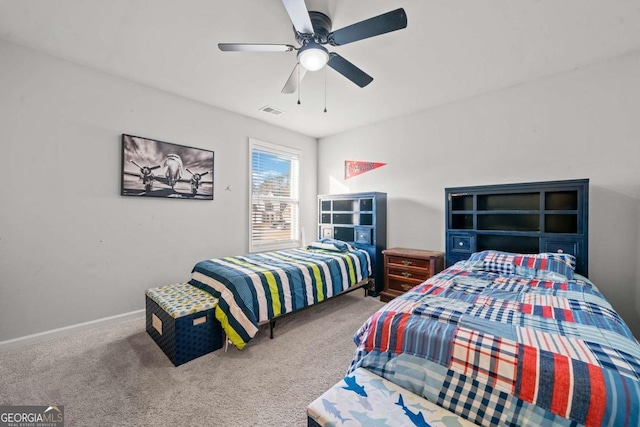 carpeted bedroom with ceiling fan