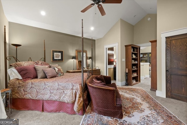 carpeted bedroom featuring high vaulted ceiling