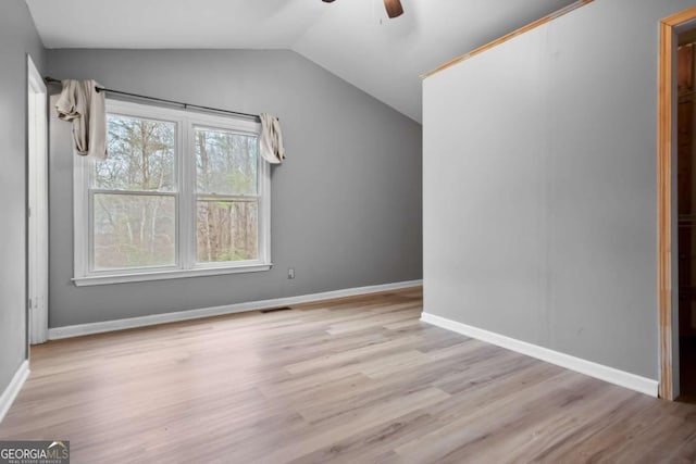 bonus room with vaulted ceiling, light hardwood / wood-style floors, and ceiling fan