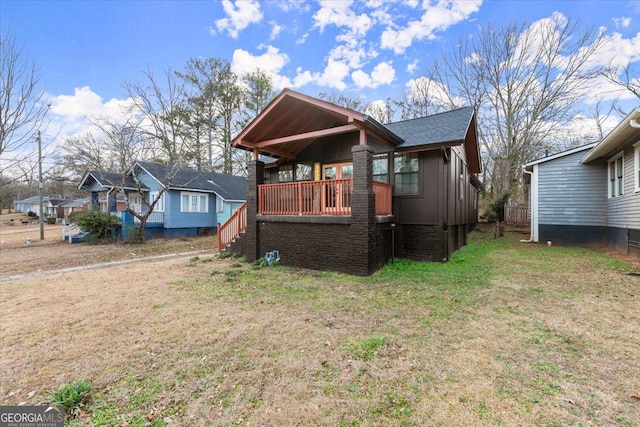 view of front of home with a front yard