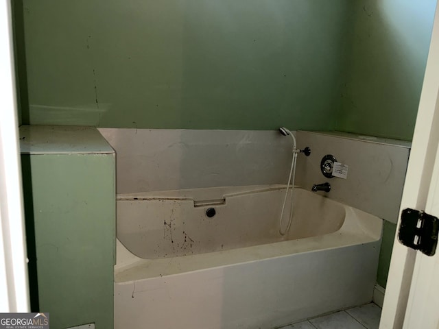 bathroom featuring a tub to relax in