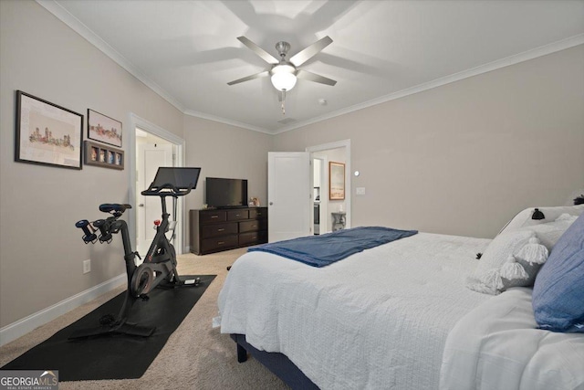 carpeted bedroom with ornamental molding and ceiling fan