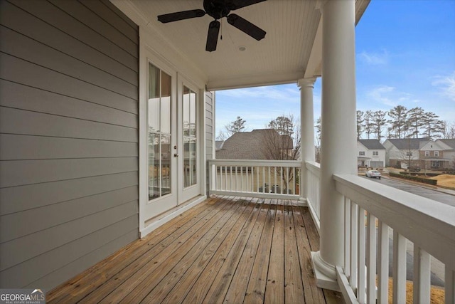 wooden terrace with ceiling fan