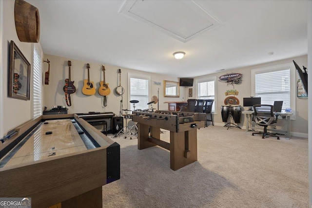 recreation room with carpet flooring