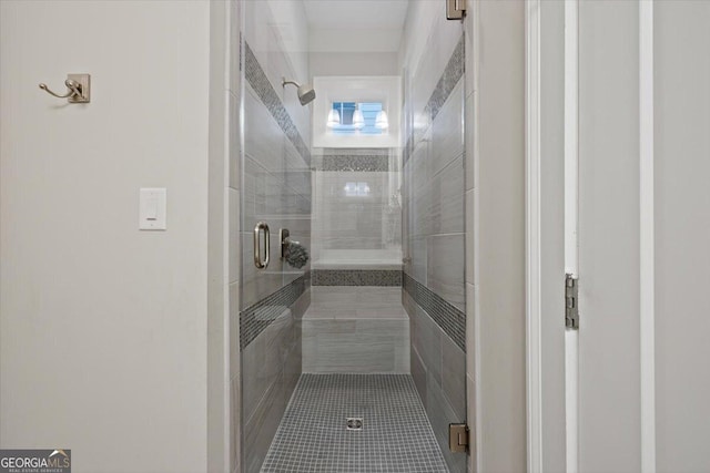 bathroom with an enclosed shower