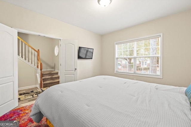 bedroom with lofted ceiling