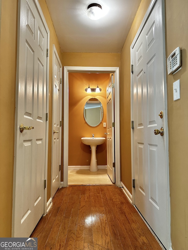 hallway featuring hardwood / wood-style floors