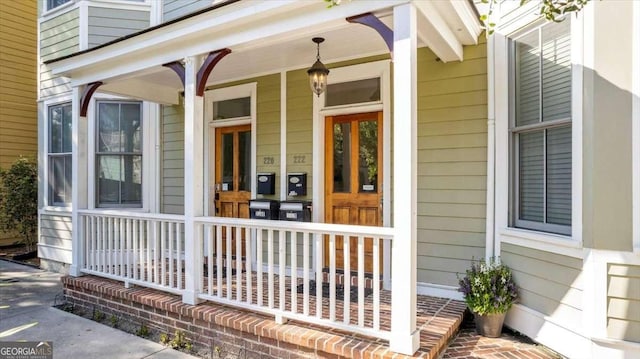 doorway to property with covered porch