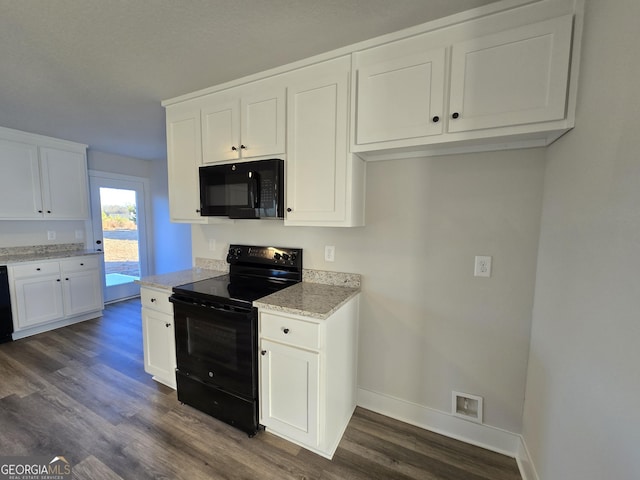 kitchen featuring white cabinetry, light stone countertops, dark hardwood / wood-style flooring, and black appliances