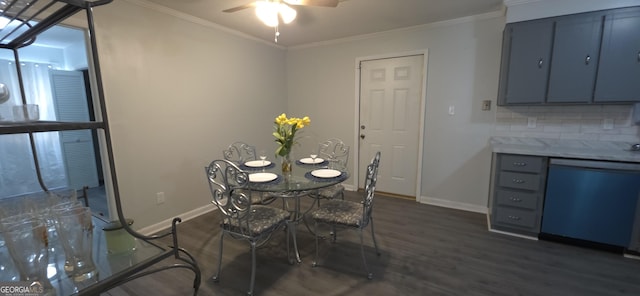 dining space featuring dark wood-type flooring, ceiling fan, and crown molding