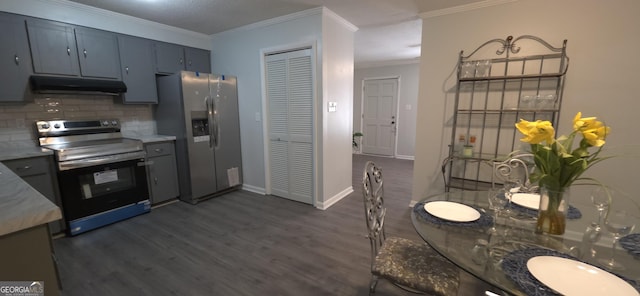 kitchen with backsplash, ornamental molding, dark hardwood / wood-style floors, and appliances with stainless steel finishes