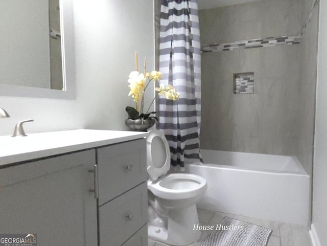 full bathroom featuring shower / tub combo with curtain, vanity, and toilet